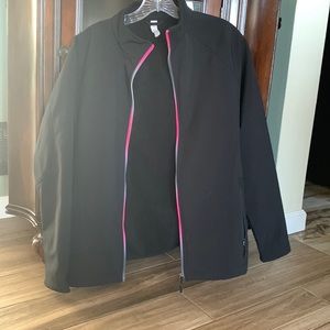 Size M zip up jacket with inside pockets and fleece lining